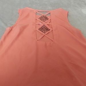 Orange sleeveless top
